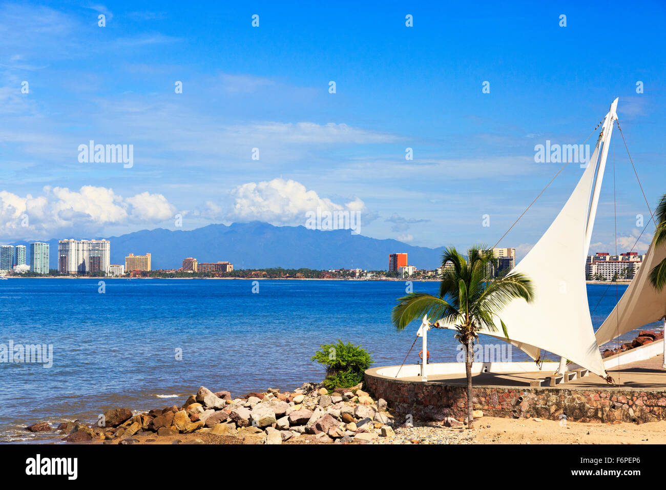 Bay of Banderas from the promenade and boardwalk at El centro district of Puerto Vallarta, Mexico with the Sierra Madre mountain Stock Photo