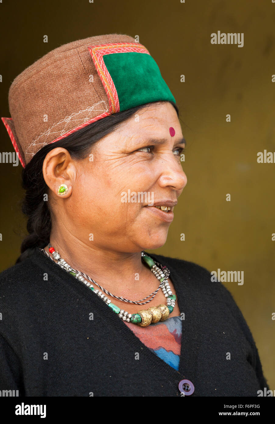 Indian woman in traditional dress and green rampouri hat from the
