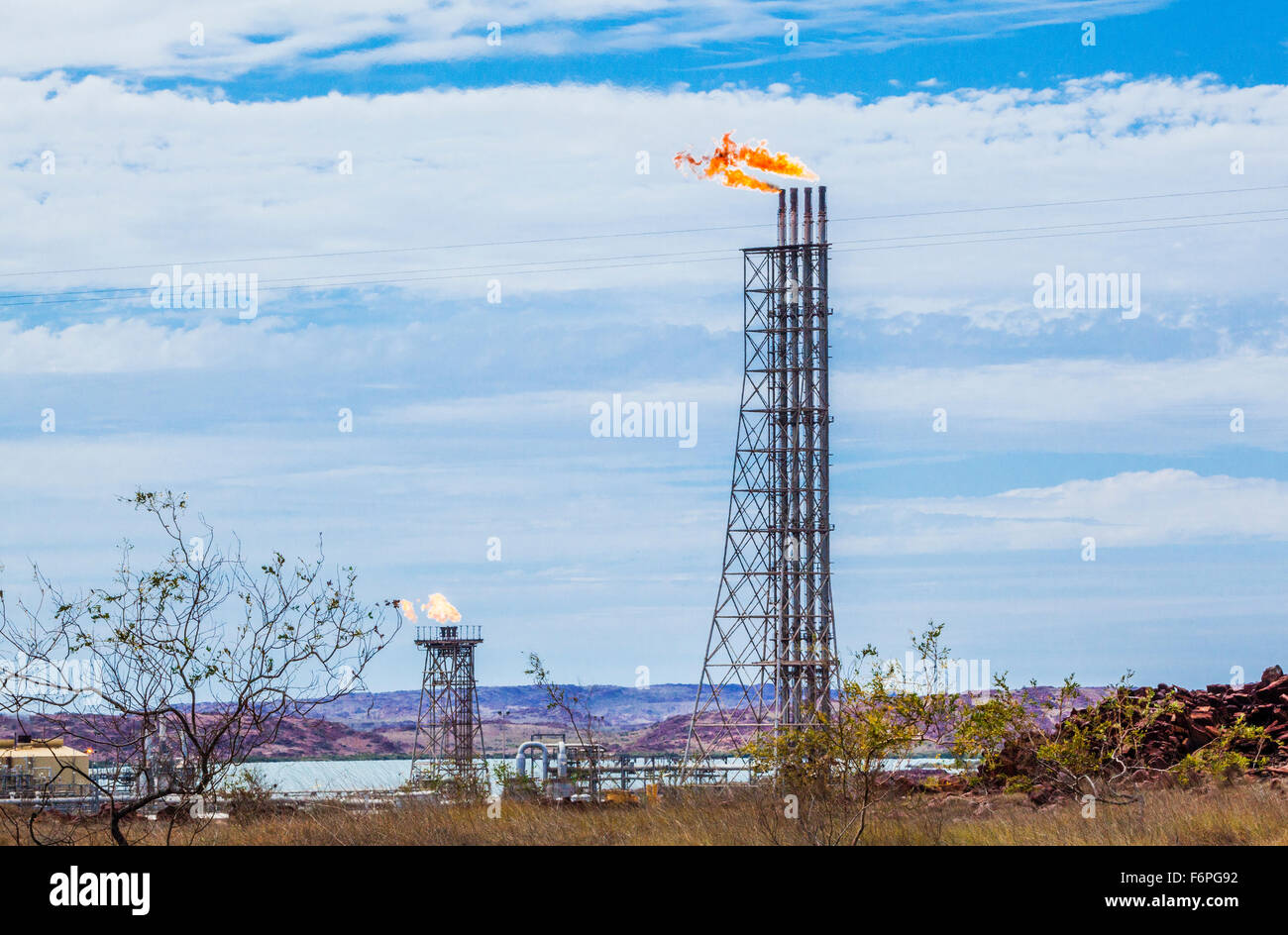 Australia, Western Australia, Pilbara, Karratha, gas flare stacks at Woodside gas processing plant on the Burrup Peninsula Stock Photo