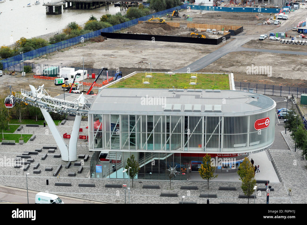 London, UK, 22 October 2015, aerial view of the Emirates Air Line terminal in North Greenwich next to the O2 dome. The Emirates Air Line is a cable car link across the River Thames in London, England built by Doppelmayr with sponsorship from the airline Emirates. The service opened on 28 June 2012 and is operated by Transport for London. In addition to transport across the river, the service advertises 'a unique view of London' Stock Photo