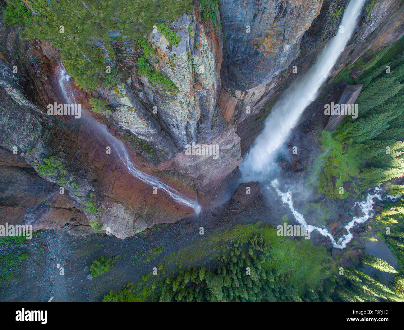 Bridal Veil Falls iand fog ,  Uncomphagre National Forest, Colorado, 365 foot falls at end of Telluride box canyon, San Juan Mou Stock Photo