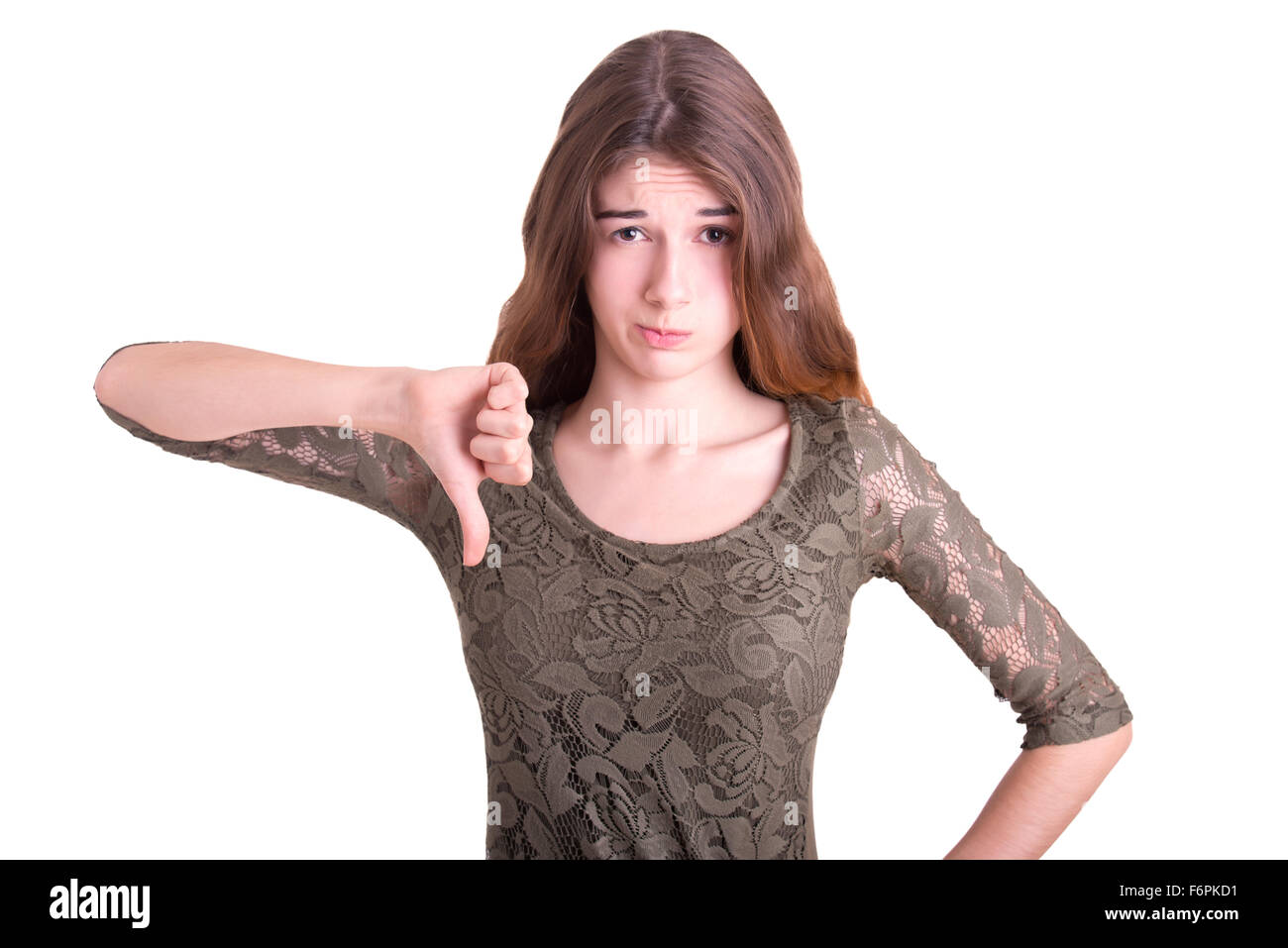 Woman showning negative feelings with her thumb down, isolated in white Stock Photo