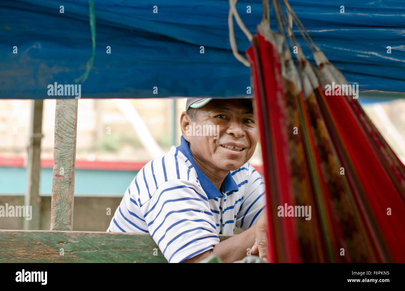 Passenger on the boat in the Pucallpa port, Amazon Peru Stock Photo