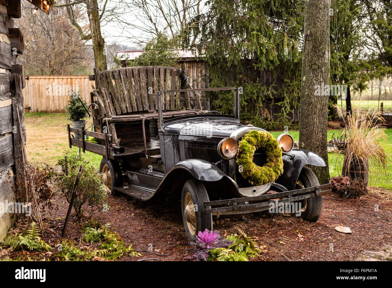 Old antique Model T Ford convertible decorated for Christmas at the Jailhouse Industry's Lawn Chair Theater in Leipers Fork, Tennessee. Stock Photo