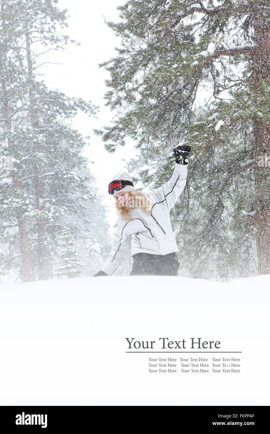 Portrait of young beautiful woman on winter outdoor background. Banner, lots of space. Stock Photo