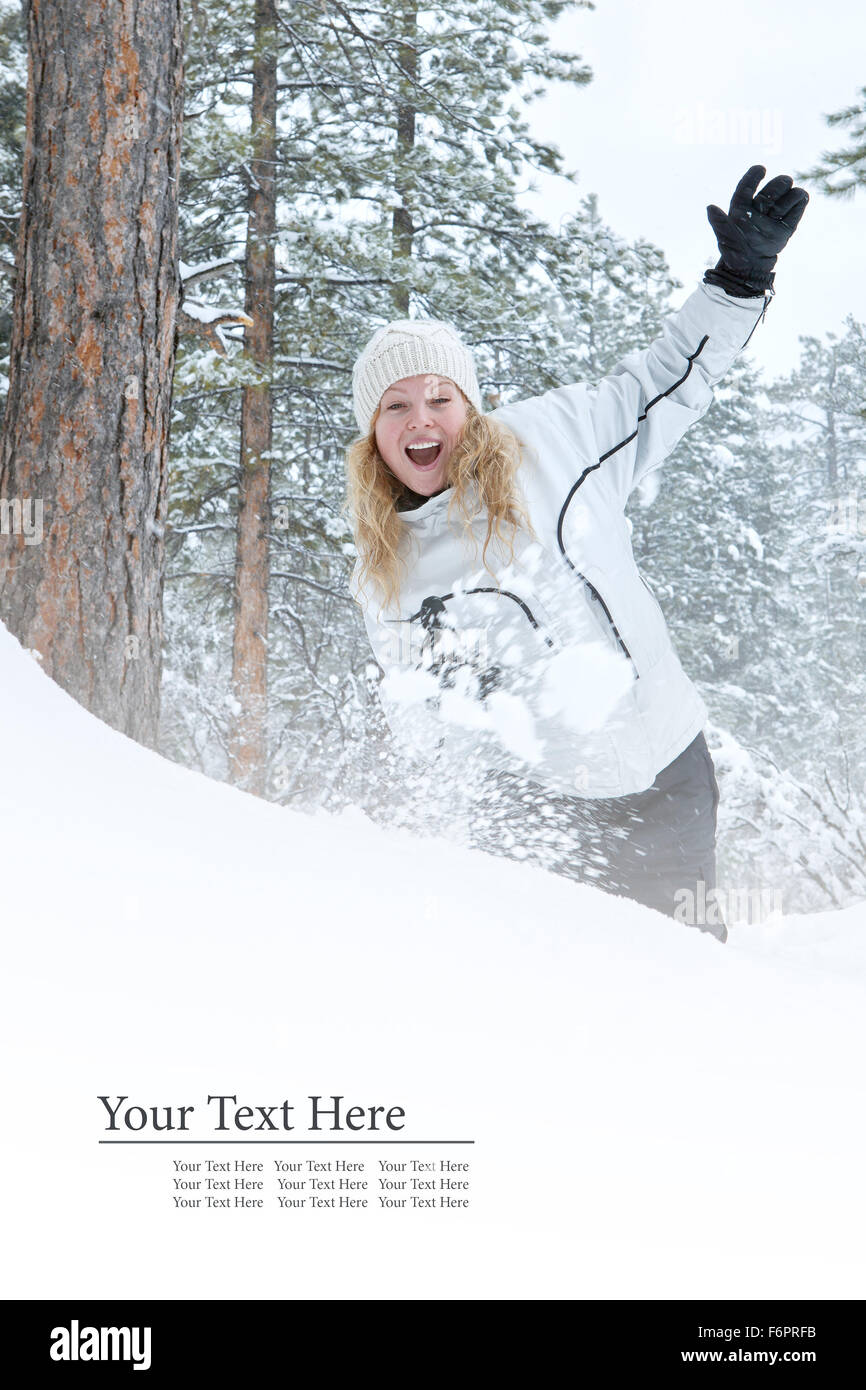 Portrait of young beautiful woman on winter outdoor background. Banner, lots of space. Stock Photo