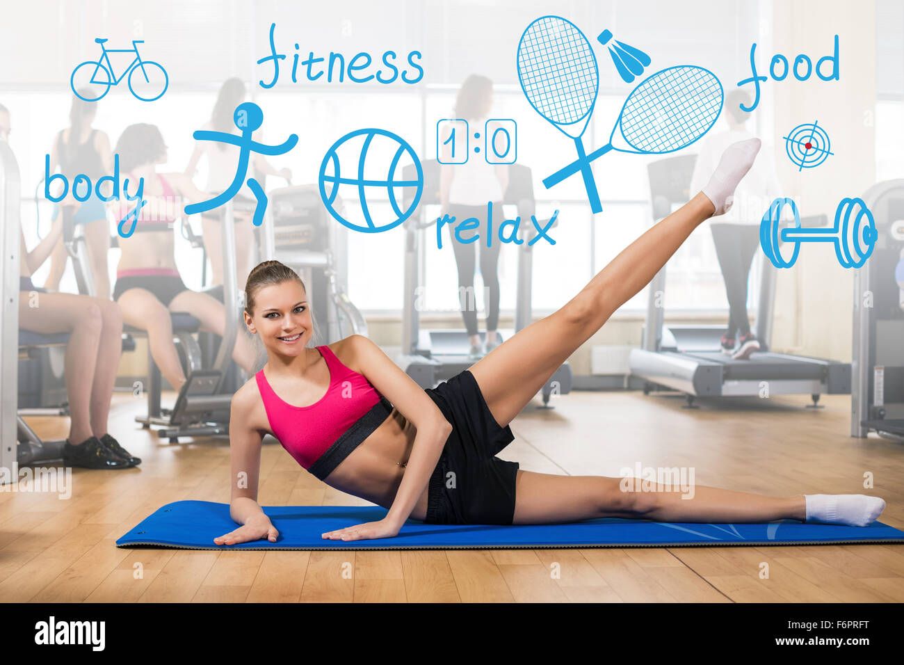 Woman makes sports exercise Stock Photo