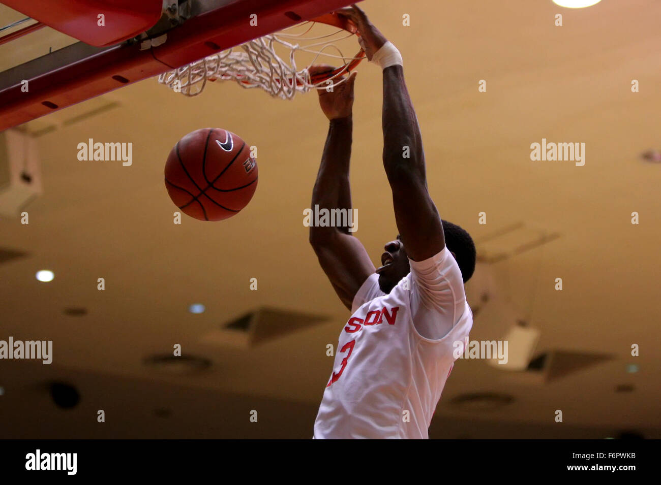 Houston, TX, USA. 18th Nov, 2015. University of Houston forward Bertrand Nkali 13 dunks the