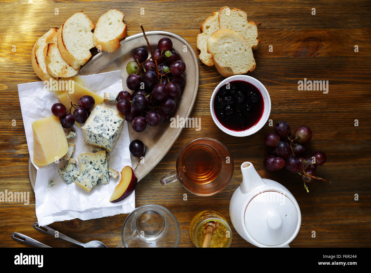 tea with cheese and jam on table top view Stock Photo