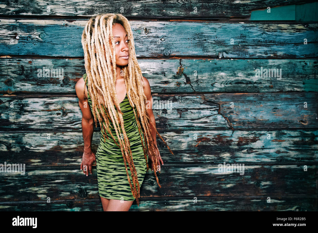 Black woman standing hi-res stock photography and images - Alamy