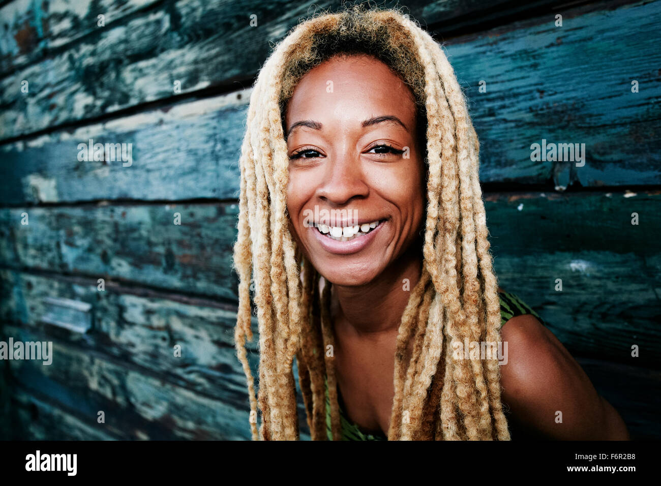 Young black woman dreadlocks smiling hi-res stock photography and ...