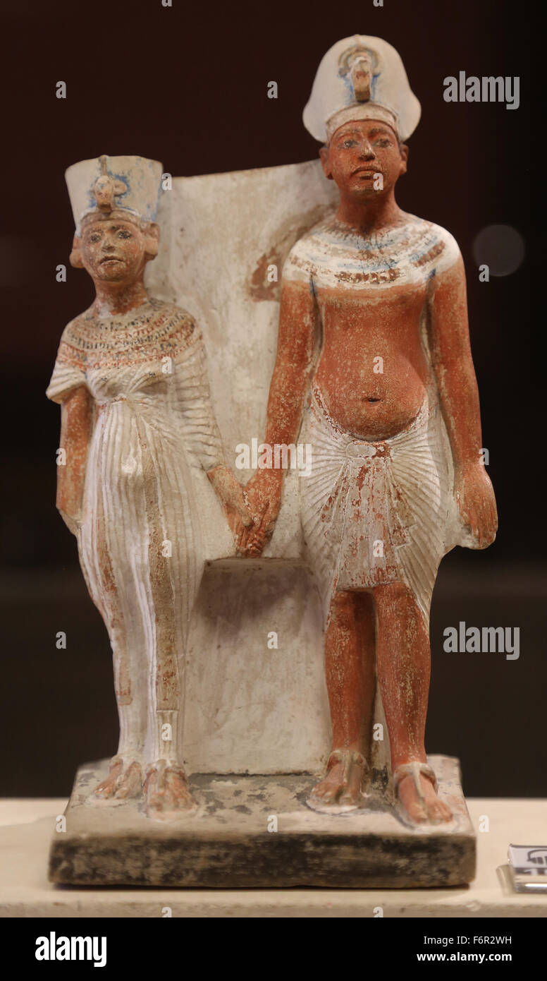 Egypt art. Akhenaton and Nefertiti. Statue. 1345 BC. portrait. New Kingdom. Limestone. 18th Dynasty. Louvre Museum. Paris. Franc Stock Photo