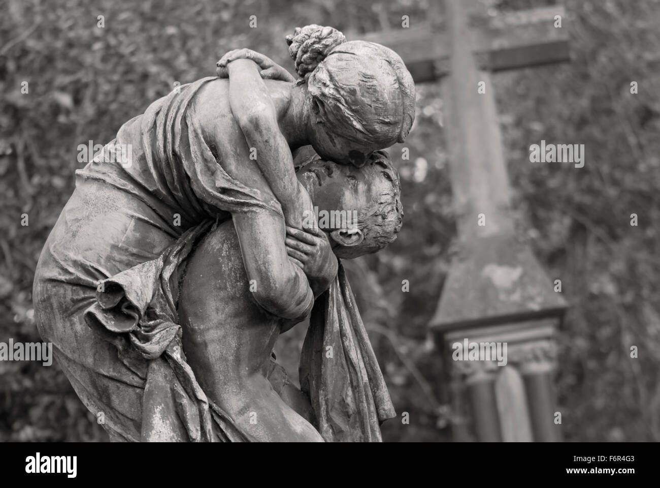 Embrace - Woman and Child Tomb Sculpture Stock Photo