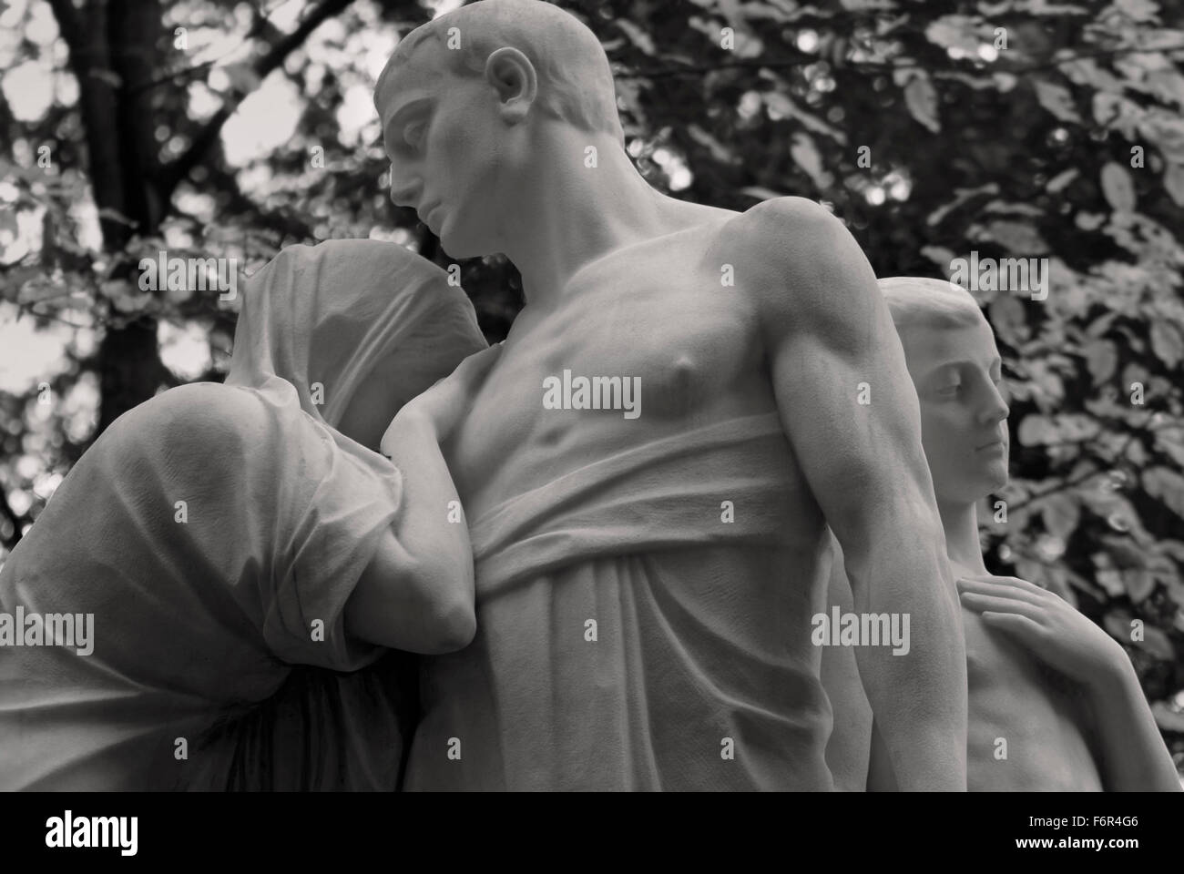 Family in Grief - Graveyard Tomb Sculpture Stock Photo