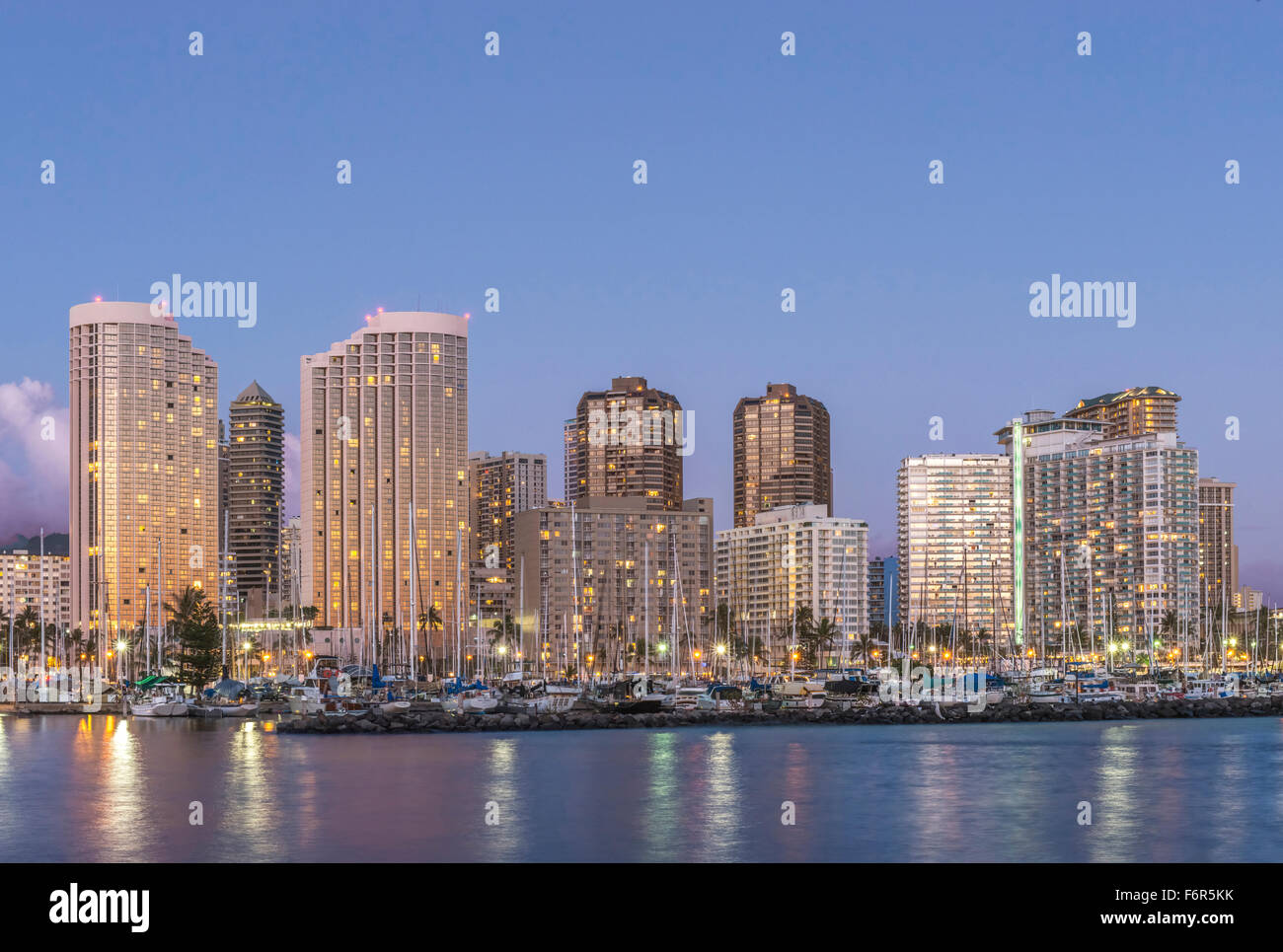 Honolulu city skyline reflection in ocean, Hawaii, United States Stock Photo