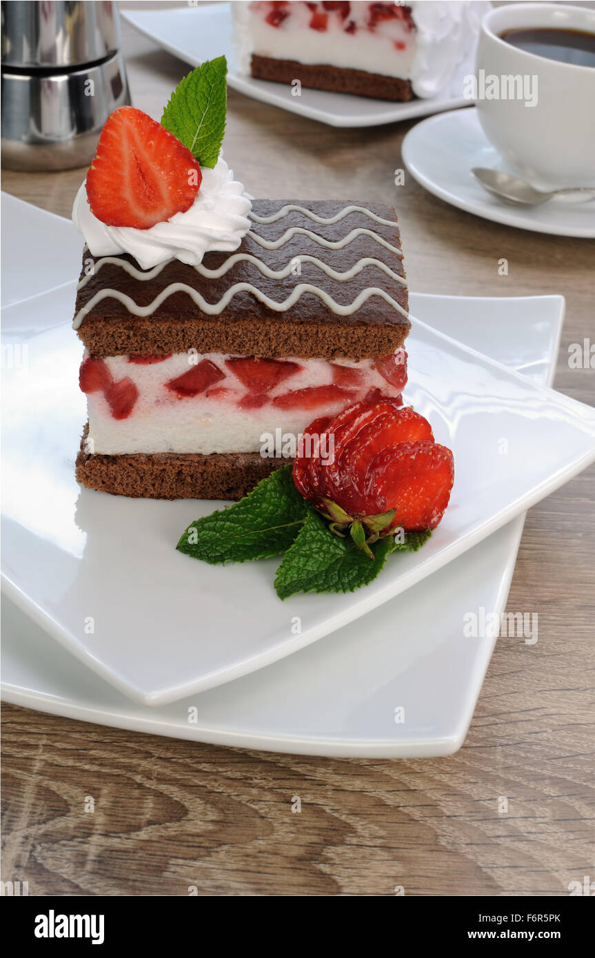 Strawberry souffle on a chocolate sponge cake Stock Photo Alamy
