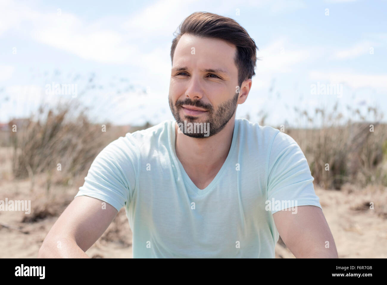 Man with beard on the beach hi-res stock photography and images - Alamy