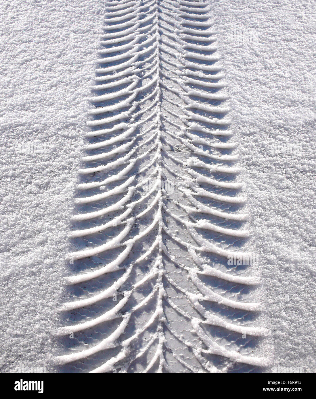 Car tyre track in snow, Bavaria, Germany Stock Photo