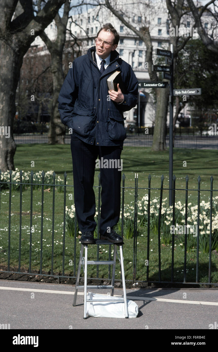 Speakers Corner in Hyde Park man on a ladder holding the Bible Stock ...