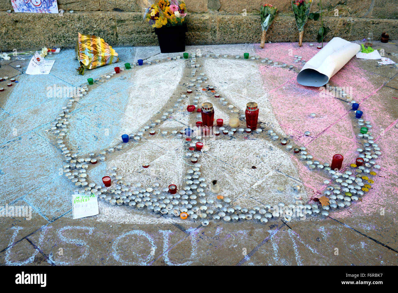 Aix-en-Provence, France. 19th November, 2015. Pray for Paris. Memorial outside the Town Hall in Aix-en-Provence, France for the victims of the Paris attacks in the form of the Eiffel Tower, the French flag and the peace symbol formed by candles. Credit:  Chris Hellier/Alamy Live News Stock Photo
