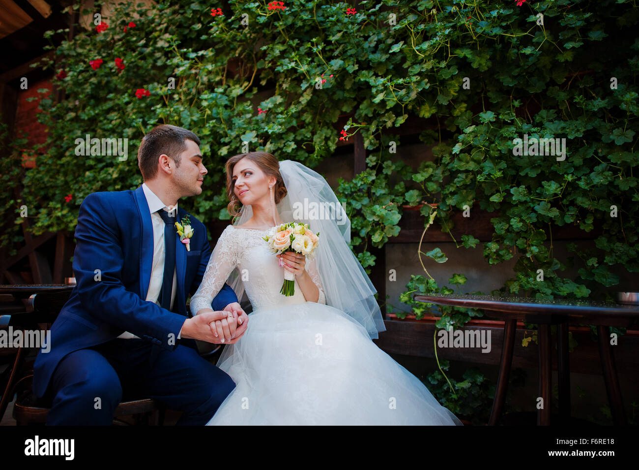 Marriage couple background green brush with red roses Stock Photo - Alamy