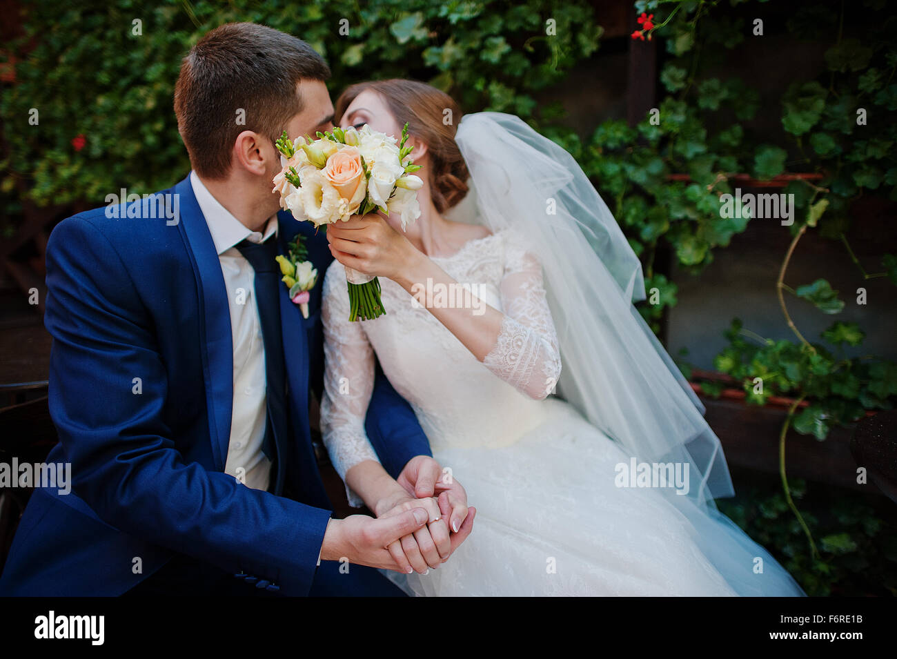 Marriage couple background green brush with red roses Stock Photo - Alamy