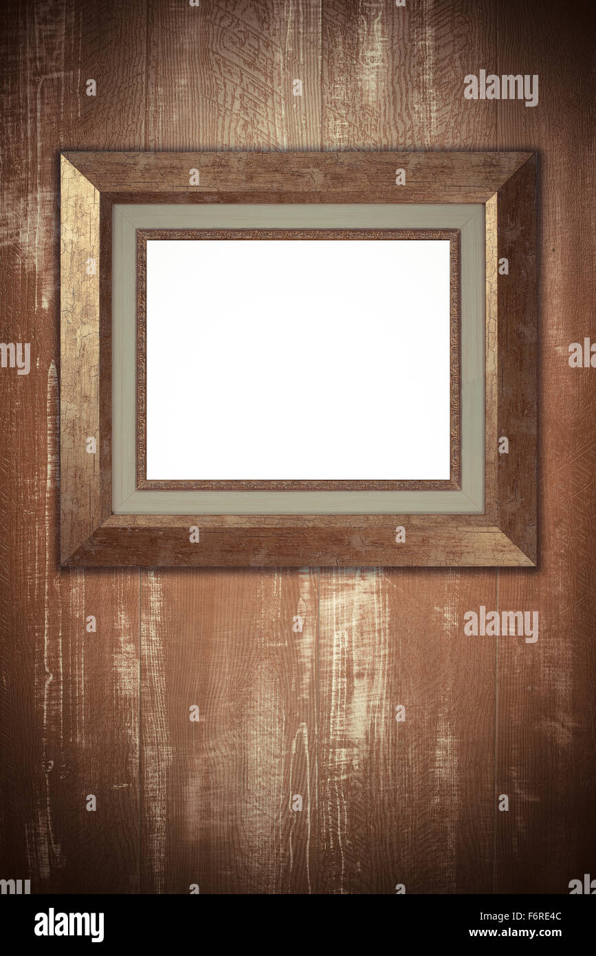 Old picture frame on vintage wood wall Stock Photo - Alamy