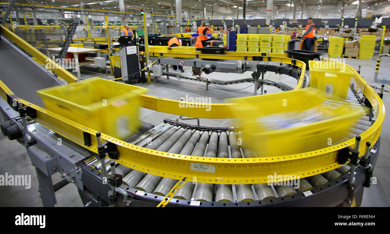 Employees at the Amazon logistics center prepare packages for delivery in  Leipzig, Germany, 19 November 2015. Christmas sales have now begun for the  online commerce company with its over two million customers
