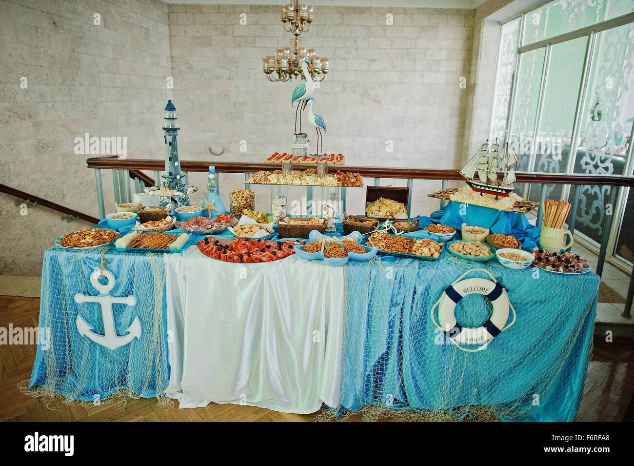 wedding reception on blue white sea theme Stock Photo - Alamy