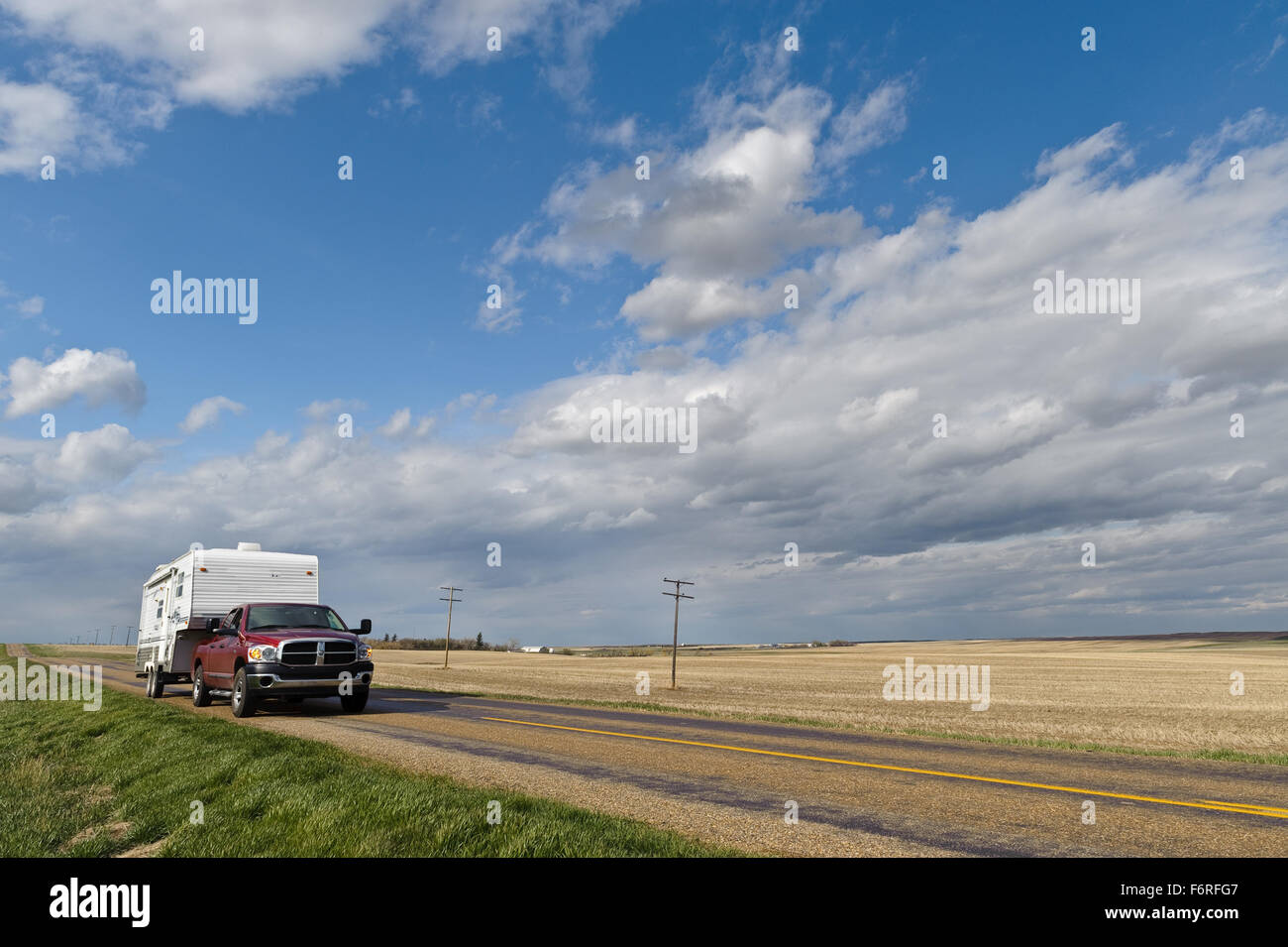 riding with a motorhome on road to Canadian Prairies in Mankota rural country of Saskatchewan, Canada Stock Photo