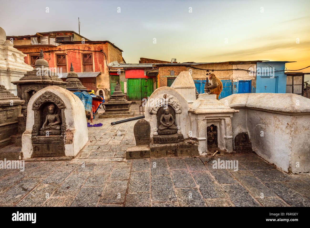 Sunrise above Swayambhunath temple complex in Kathmandu, Nepal.  Swayambhunath is also known as the Monkey Temple as there are h Stock Photo