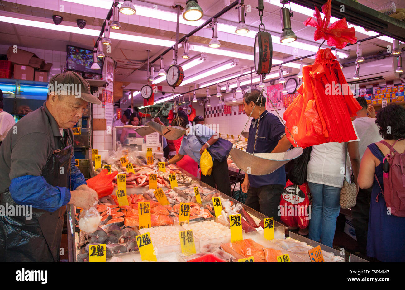 Fresh fish market in Chinatown New York City Manhattan selling fish to