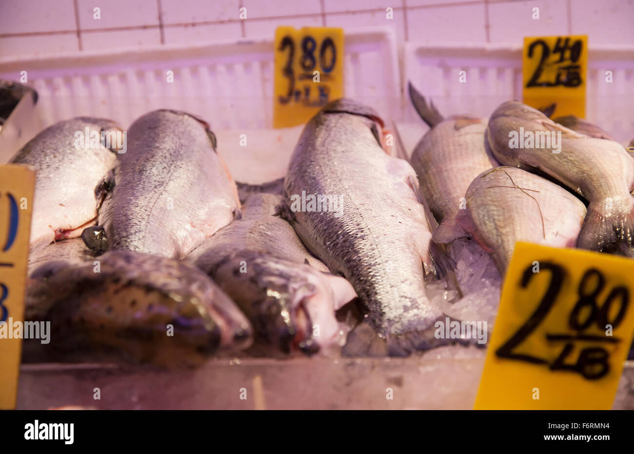 Fresh fish market in Chinatown New York City Manhattan selling fish to