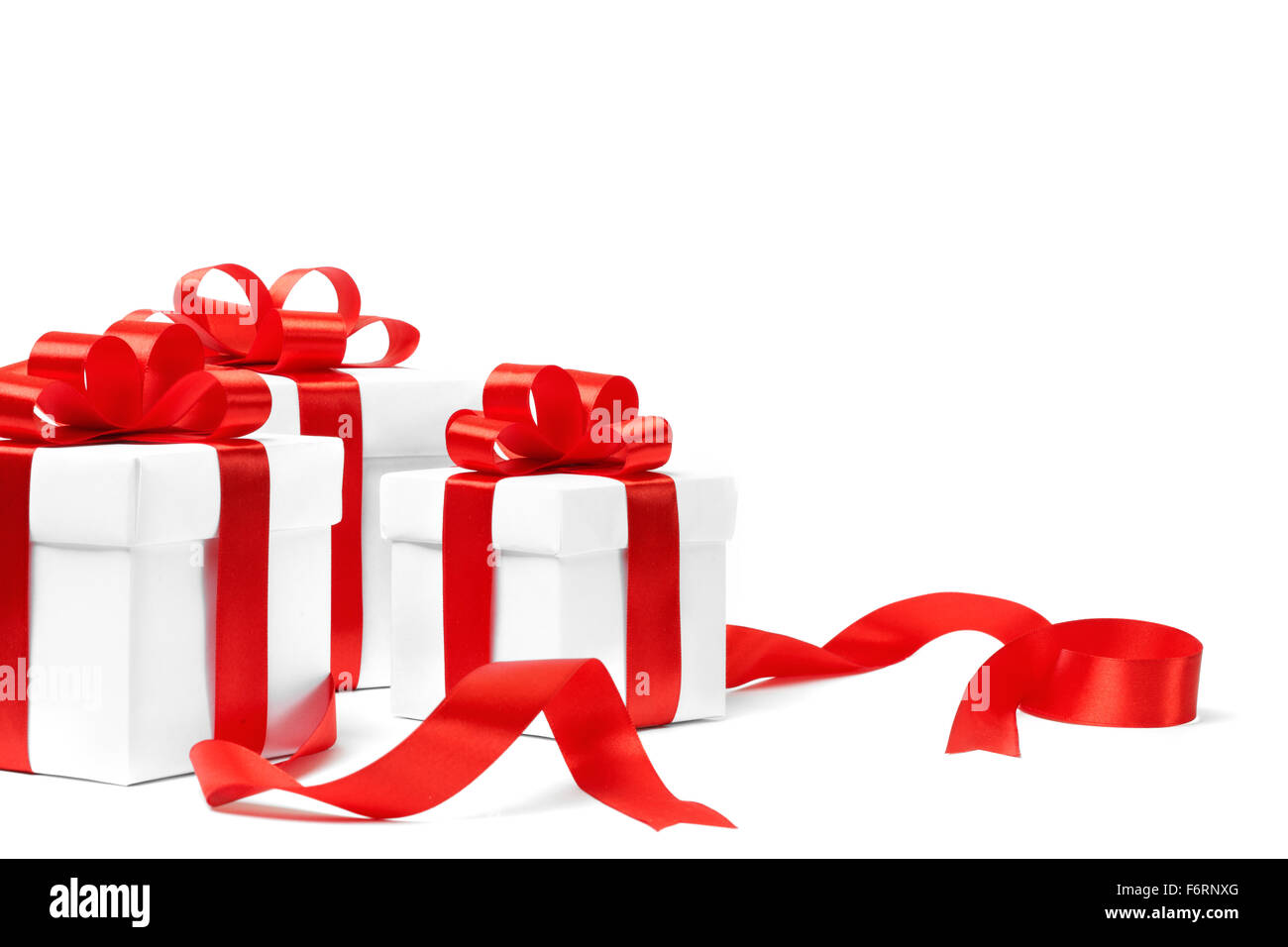 White gift box with red ribbon bow Stock Photo - Alamy