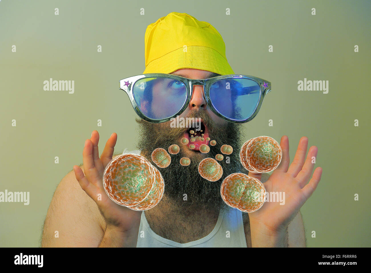 Bacteria virus sickness pouring out sick bearded mans open mouth Stock Photo