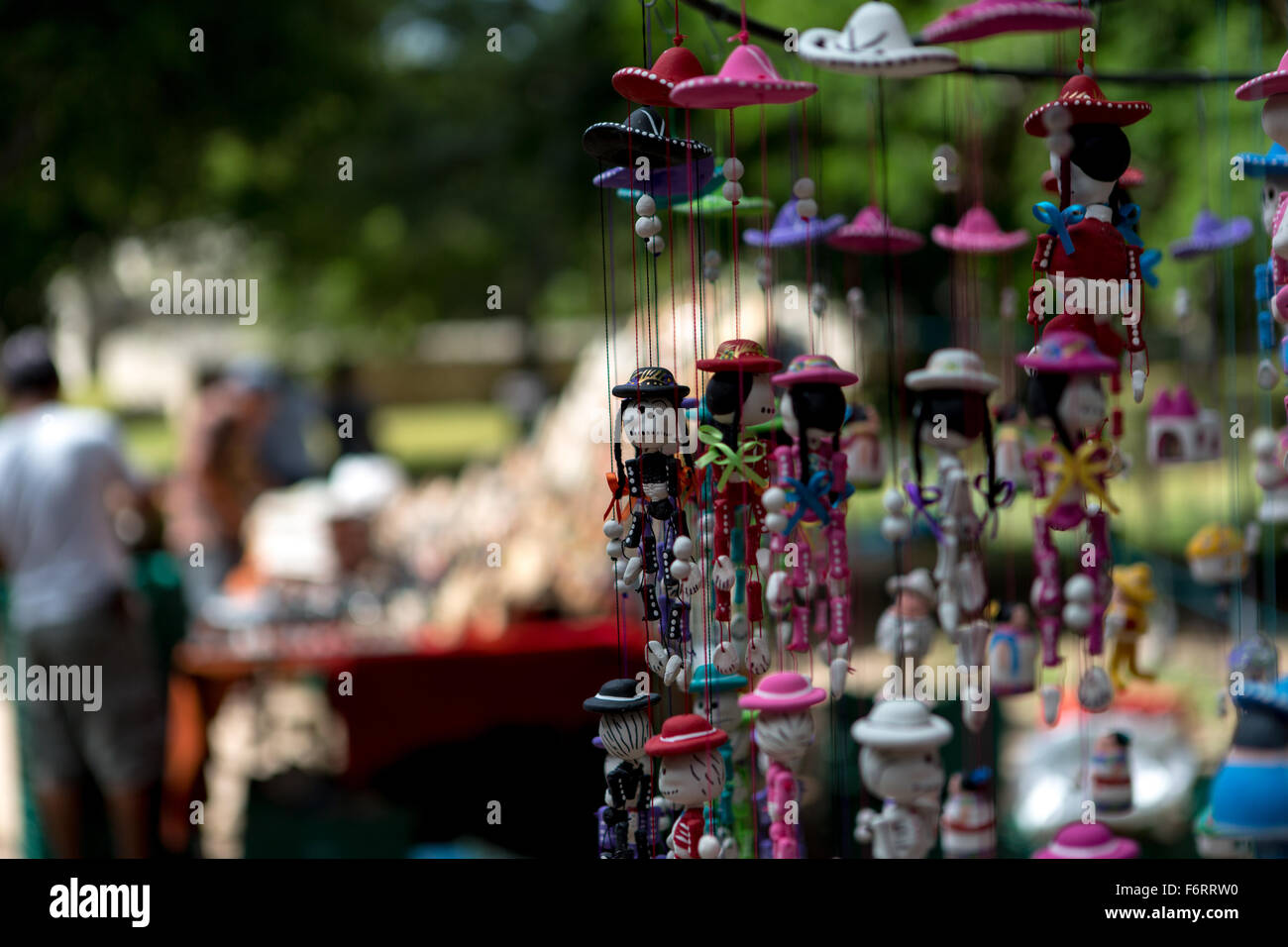 souvenirs for sale at Mayan ruins at Chichen Itza, Yucatan peninsula, Mexico. Skeleton and day of the dead puppets. Stock Photo