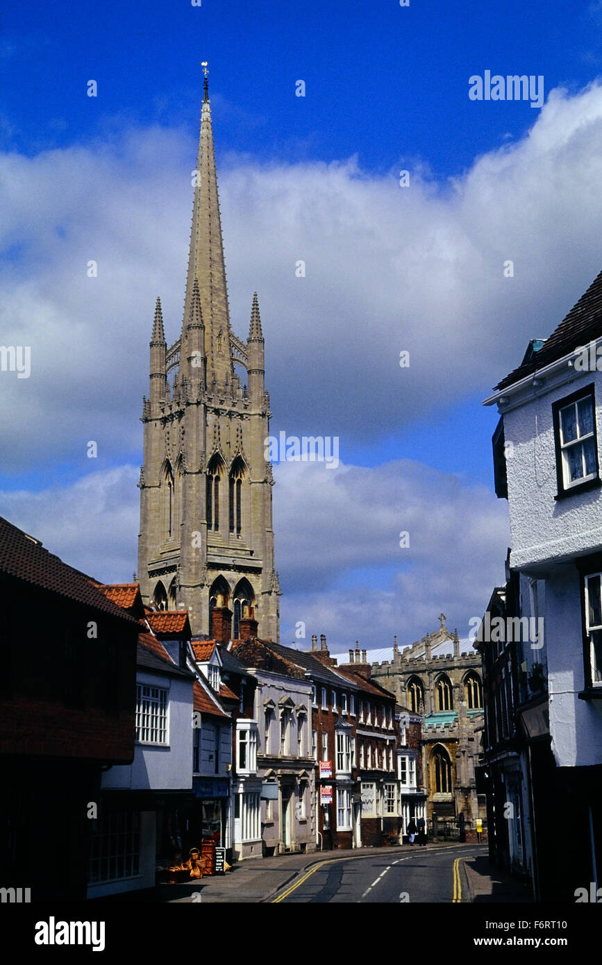 Church of St. James behind the main street and shops. Louth. Lincolnshire. England. UK. Europe Stock Photo