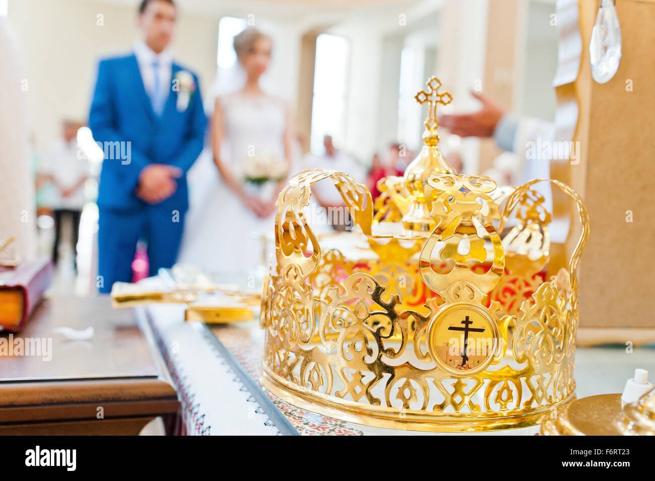wedding crown at church background newlyweds Stock Photo - Alamy