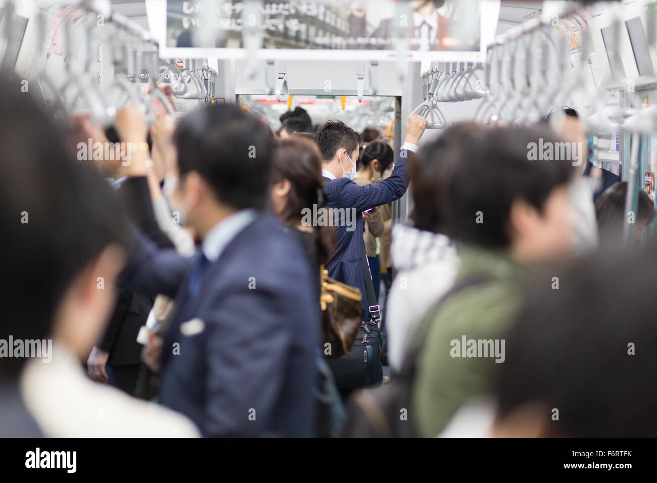 Passengers traveling by Tokyo metro. Stock Photo