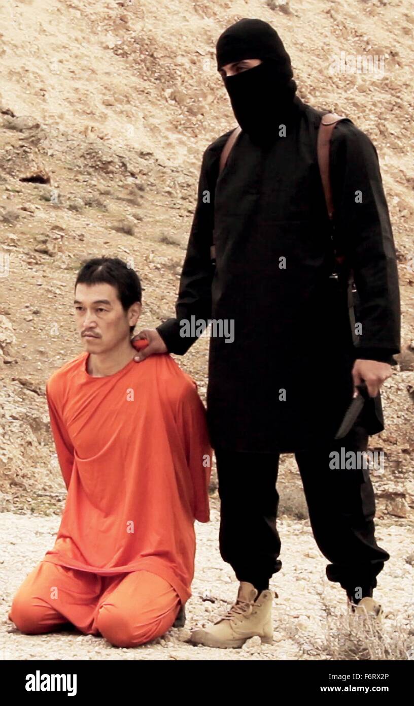 Islamic State of Iraq and the Levant propaganda photo showing the execution of Japanese journalist Kenji Goto by masked ISIS militant known as Jihadi John in February 2015. Stock Photo