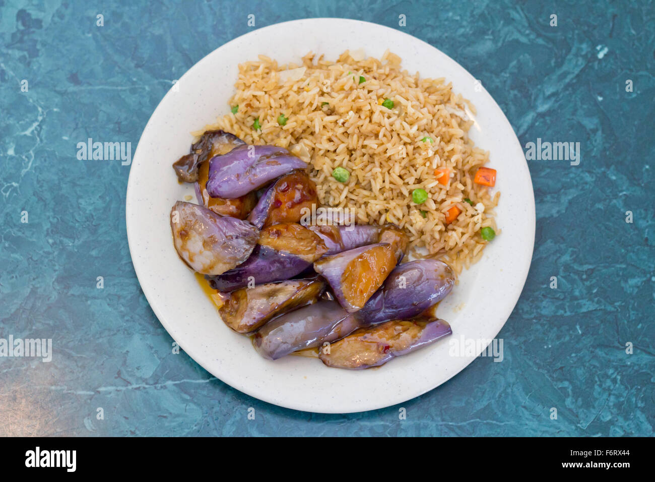 Chinese sauteed eggplant with oyster sauce and fried rice Stock Photo