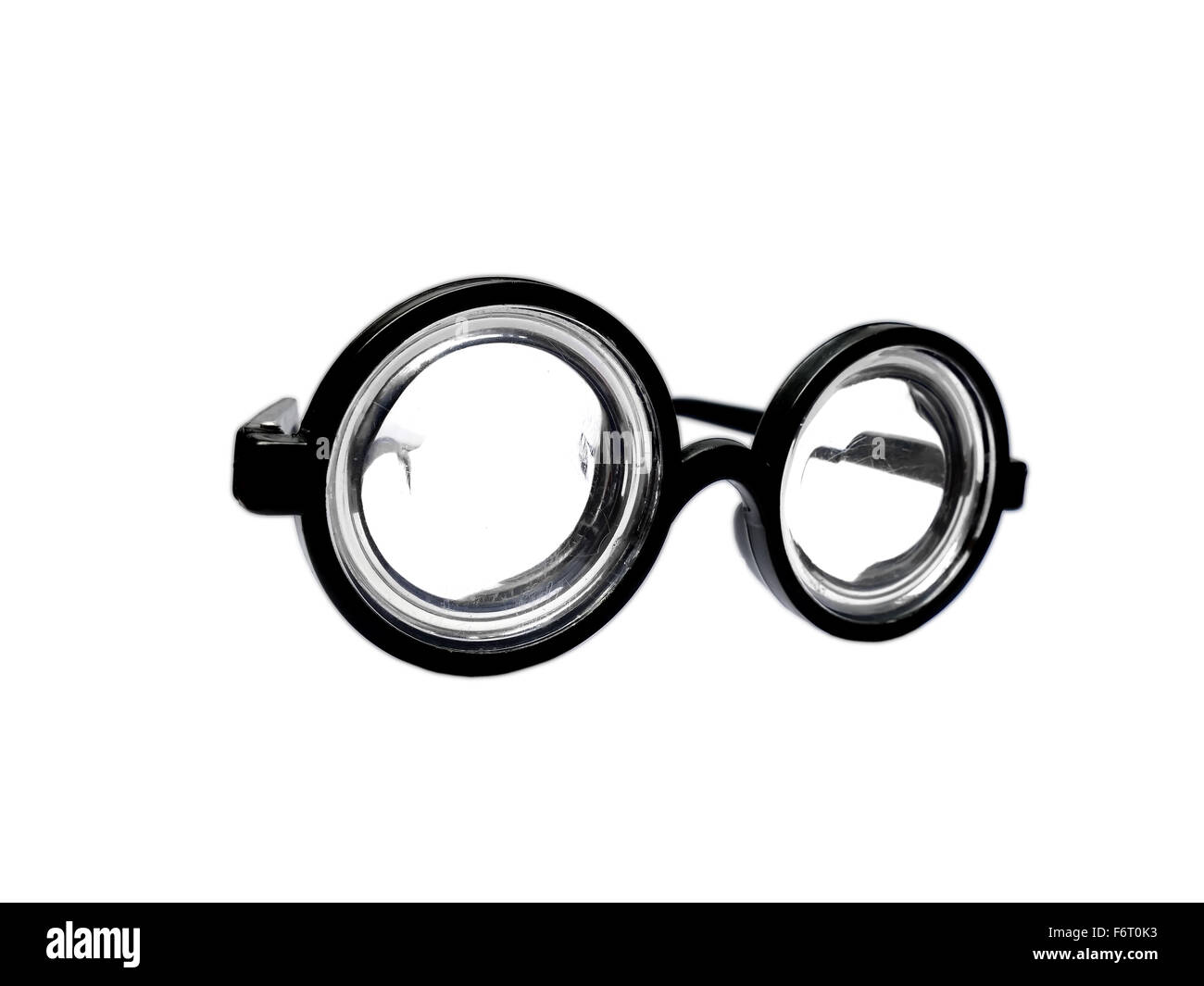 Funny toy short-sighted glasses with heavy scratching isolated on white Stock Photo