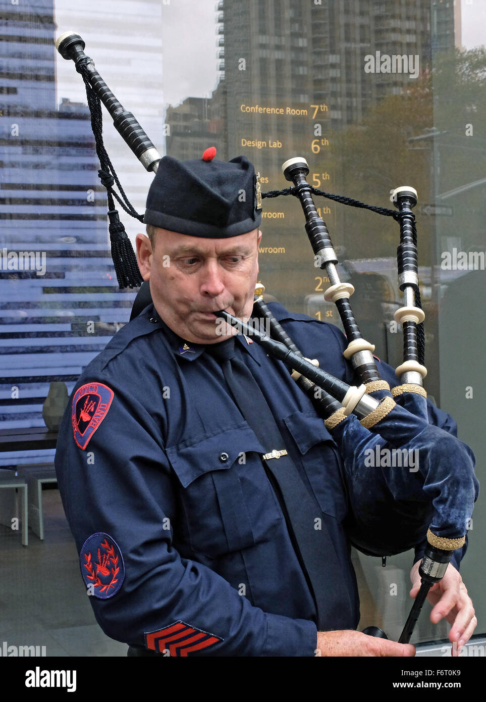A member of the New York City Corrections Department Pipe Band practicing before the Veterans Day parade in Manhattan. Stock Photo