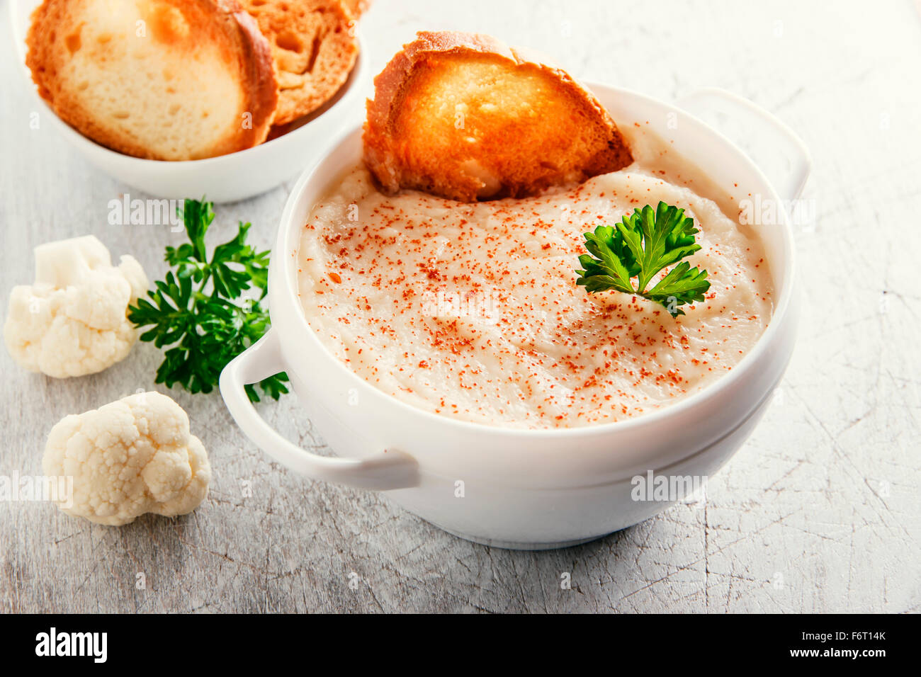 Soup puree cream with cauliflower and croutons Stock Photo - Alamy