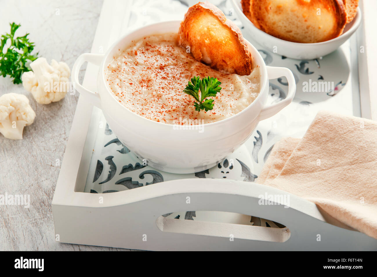 Soup puree cream with cauliflower and croutons Stock Photo - Alamy