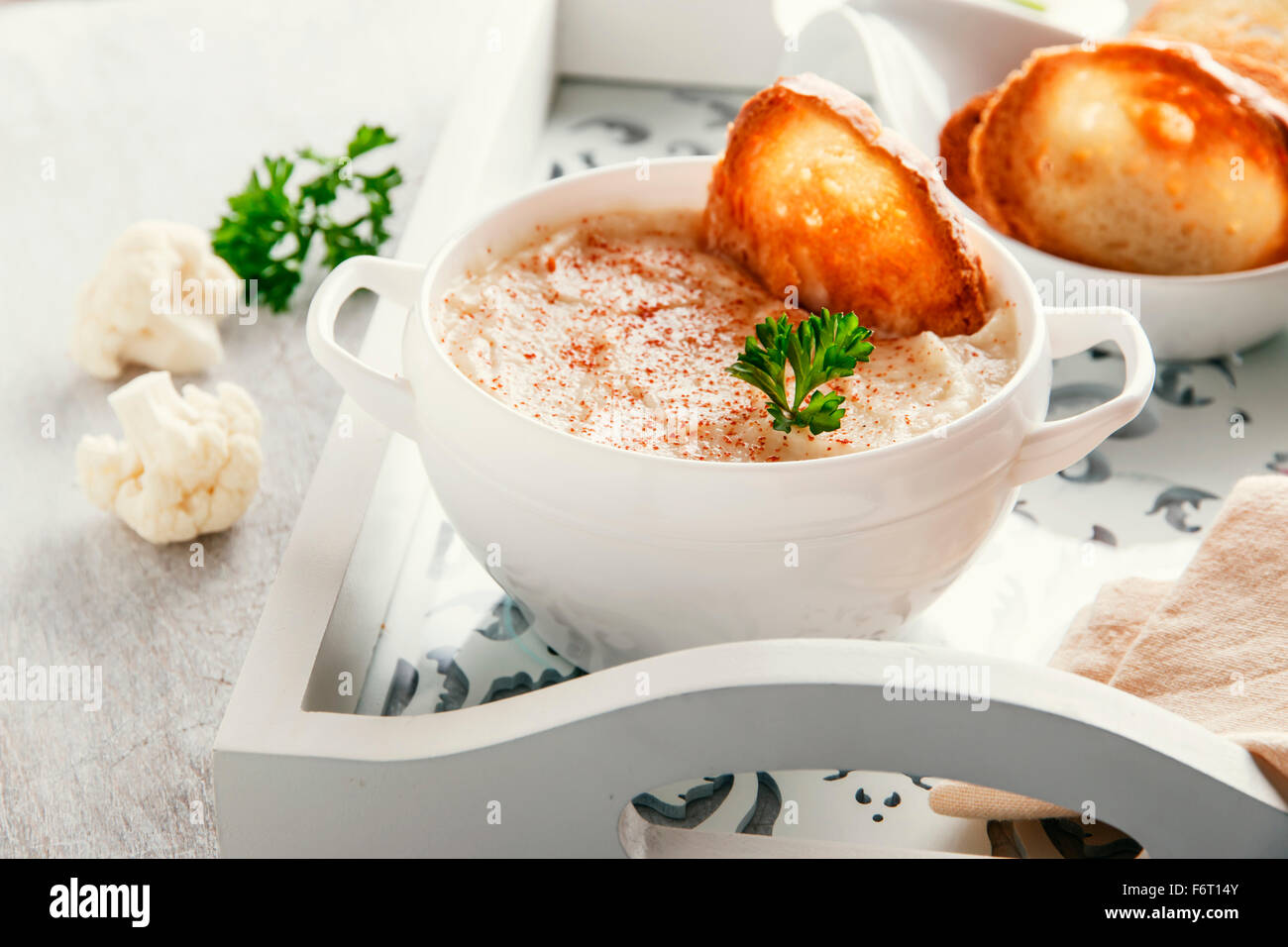 Soup puree cream with cauliflower and croutons Stock Photo - Alamy