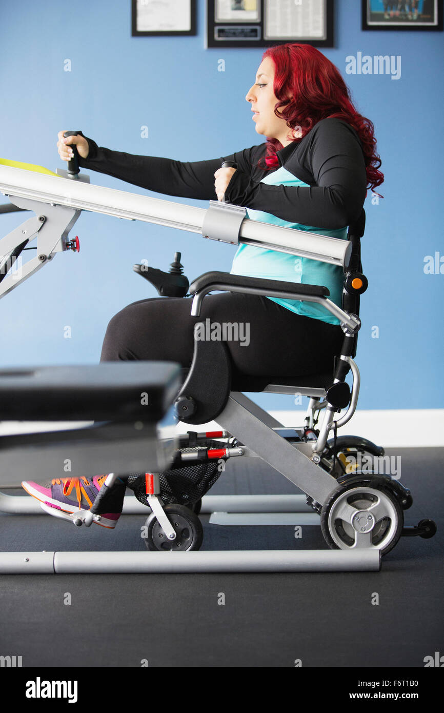 Disabled woman doing physical therapy Stock Photo