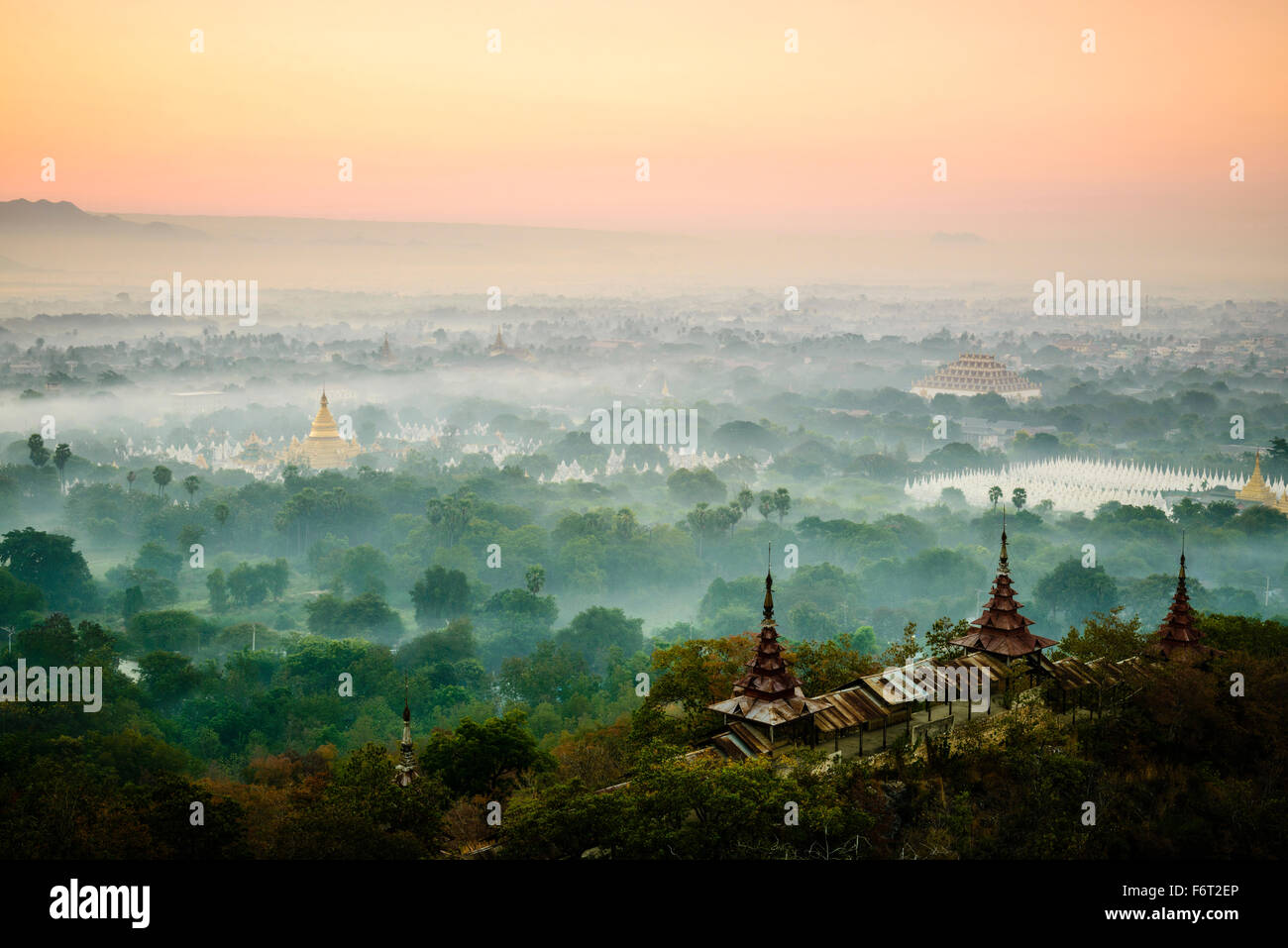 Aerial view of towers in misty landscape Stock Photo - Alamy