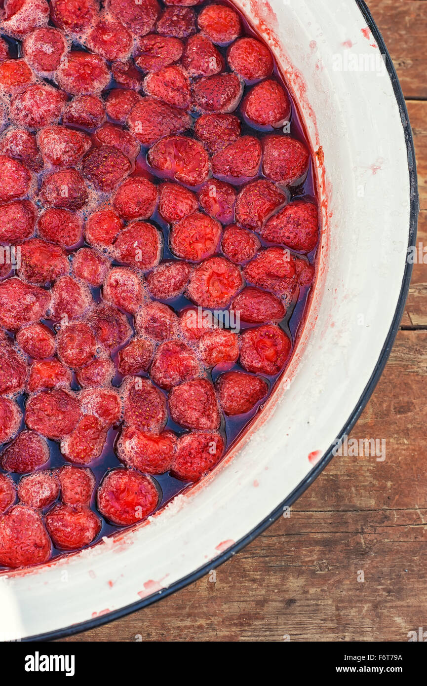 The process of making strawberry jam from fresh berries Stock Photo Alamy