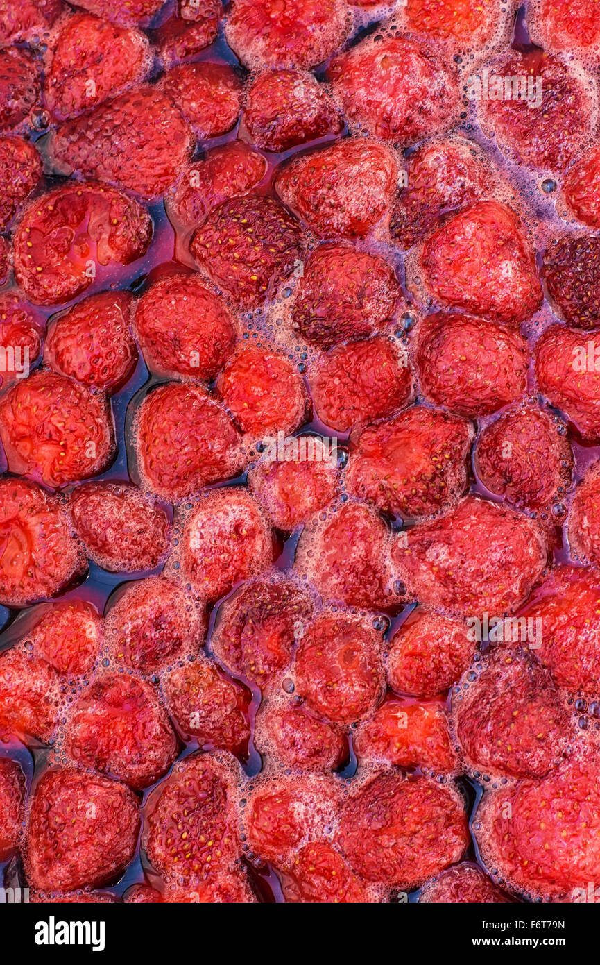 The process of making strawberry jam from fresh berries Stock Photo Alamy